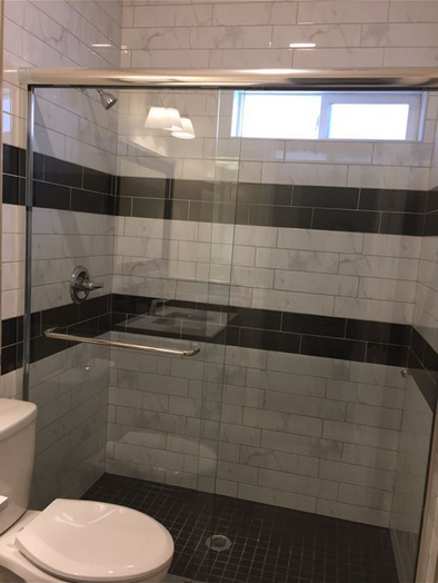 Clean tiled shower and bathroom after professional deep cleaning service in the East Bay, California